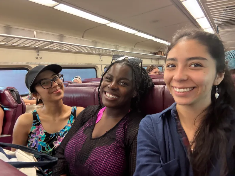 Meena, Janaysa, and Adriana on the commuter rail
