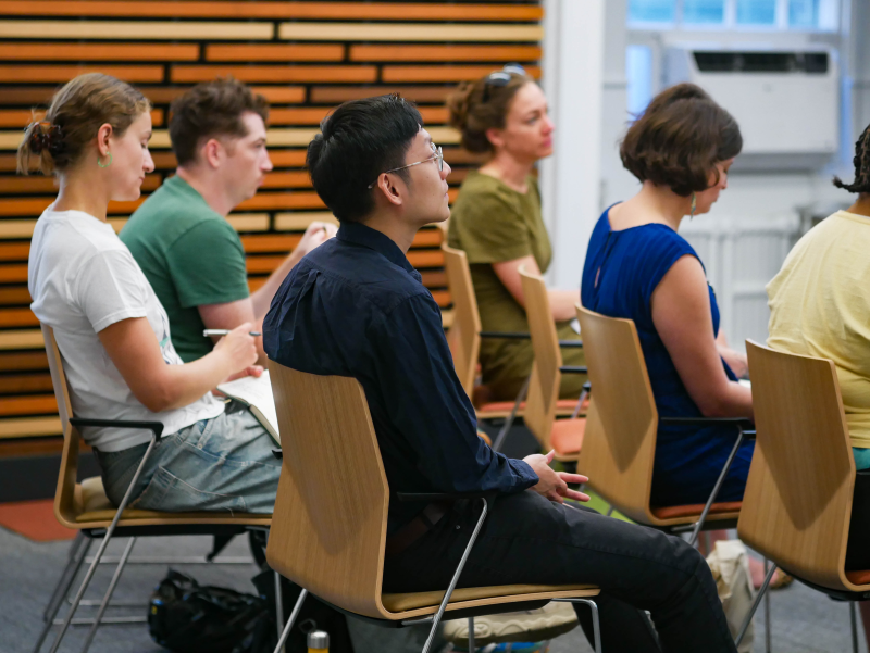 People sitting in chairs and listening at a Mignone Center of Career Success event