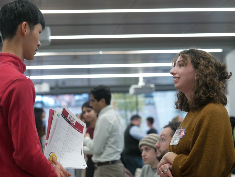 Two people having a conversation at a Mignone Center of Career Success Event.