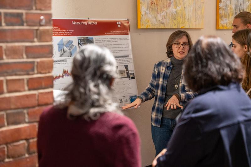 Measure Mather is explained to a group of attendees. 