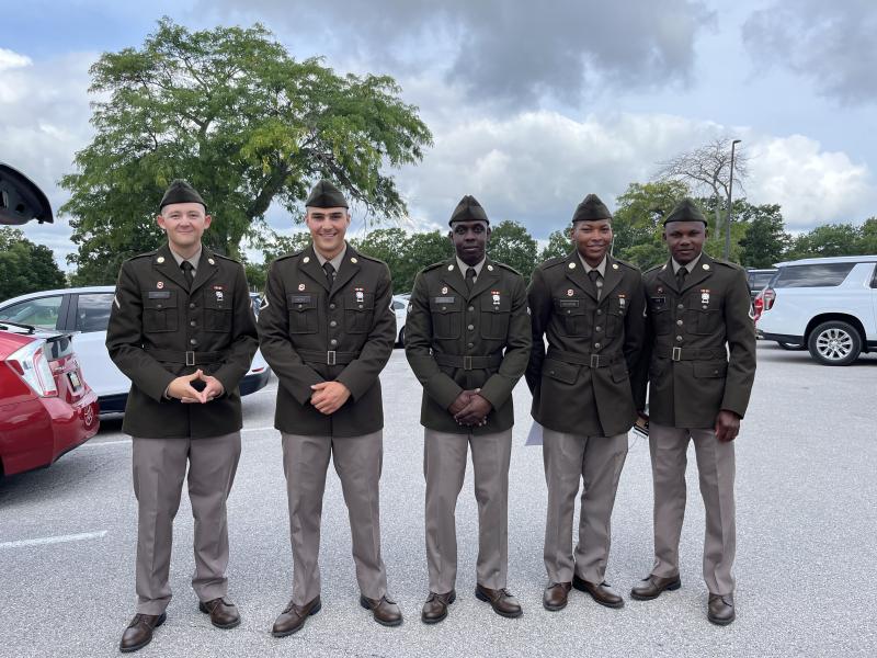 Fade and his "battle buddies" stand side by side in full uniform on their graduation day from One Station Unit Training at Fort Leonard Wood.