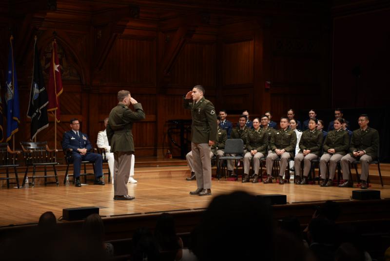 Fadule conducting a "first salute" in Sanders' Theatre for a friend's commissioning ceremony in May 2025.