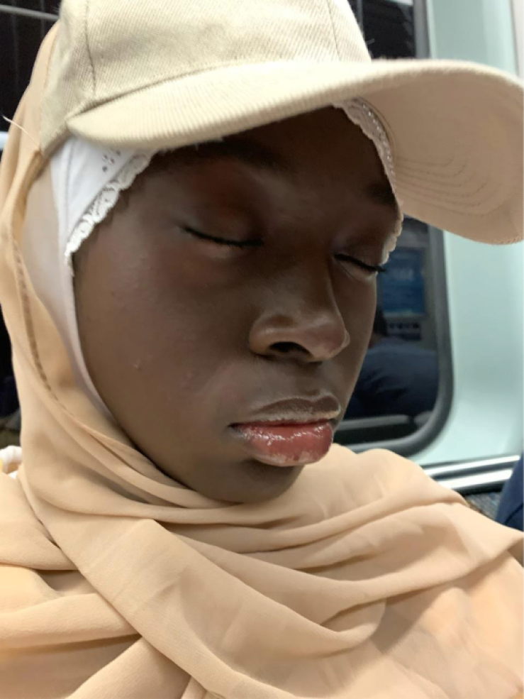 Rahma sleeping on the commuter rail