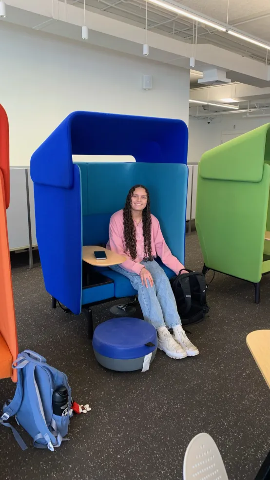 Secquoia in one of her favorite study spots in the Cabot Science Library