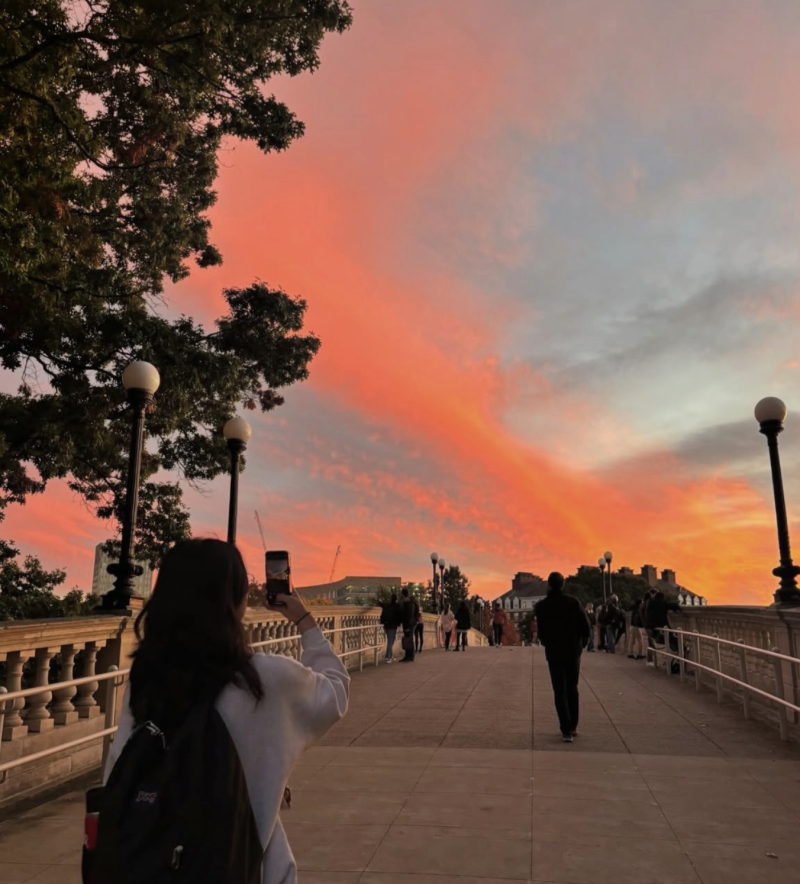 Sunset on a bridge along the Charles River.