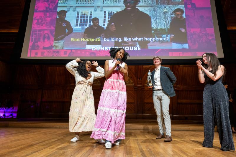 Students of Dunster House onstage accepting the Best Lyrics award.