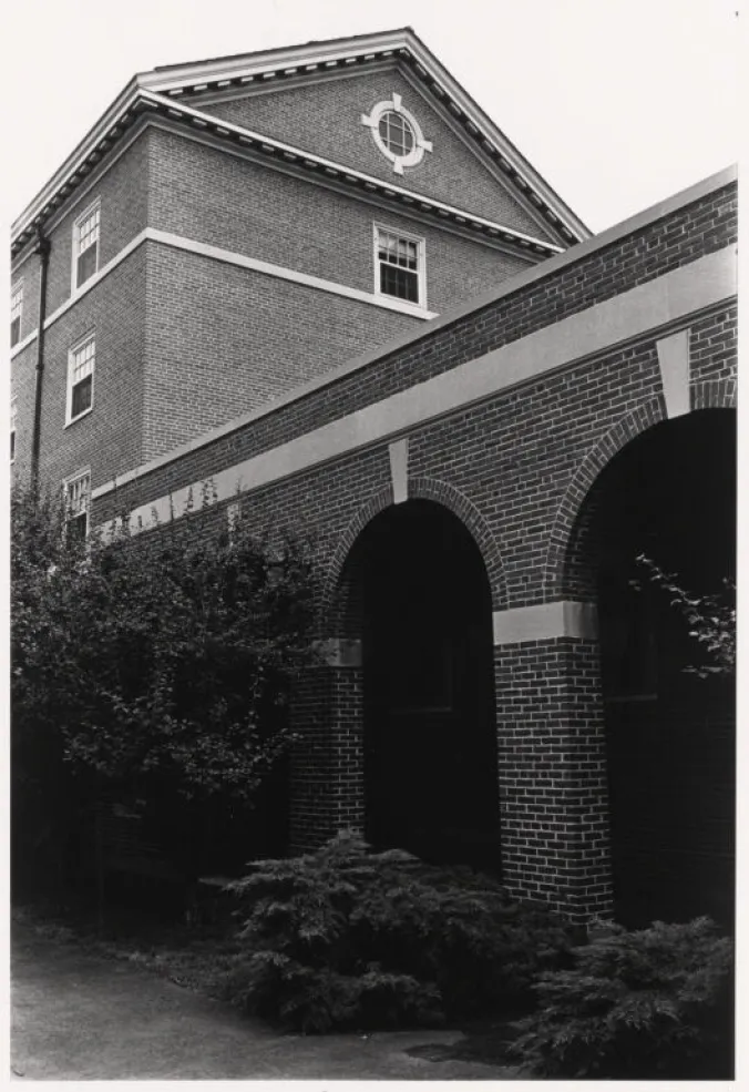 Exterior, side, partial view of North House.