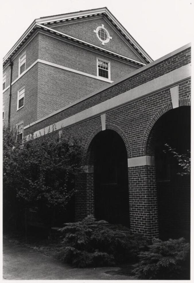 Exterior, side, partial view of North House.