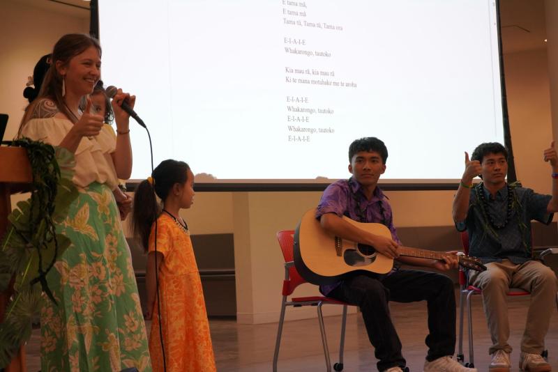 Dr. Alice Eruera and student Yuen '29 on guitar.