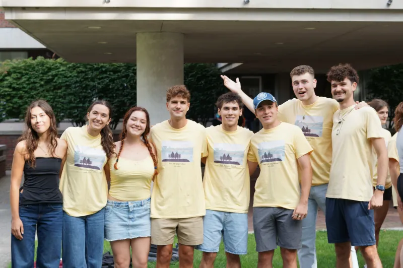 PAFs wearing matching yellow shirts together during summer orientation.