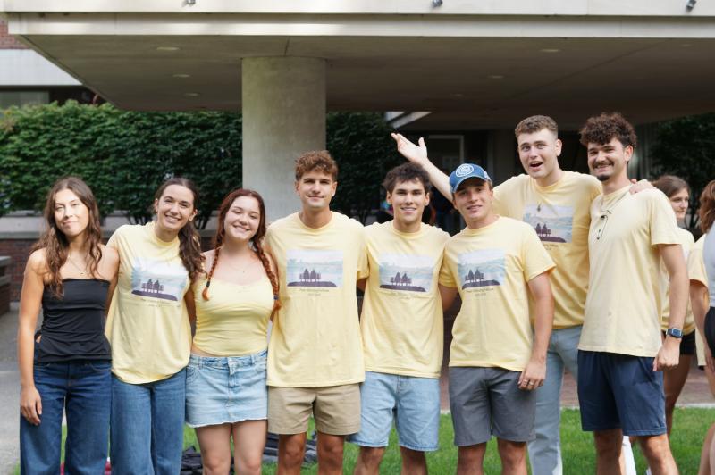 PAFs wearing matching yellow shirts together during summer orientation.