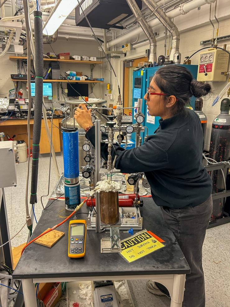 Student in a lab working on research.