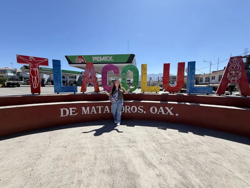 Author in front of Tlacolula name sign.