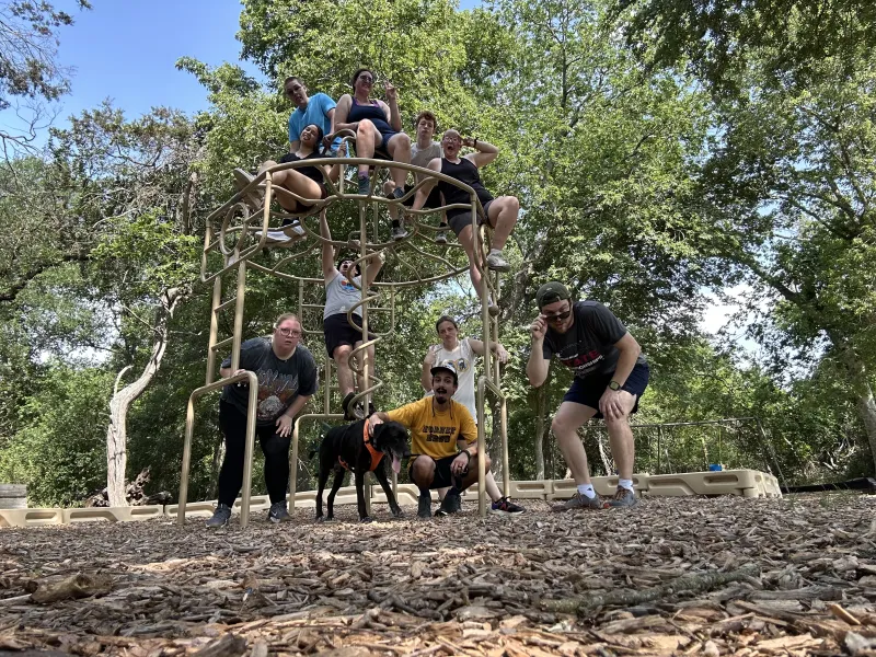 Me and my friends from home taking a photo while hiking after graduation