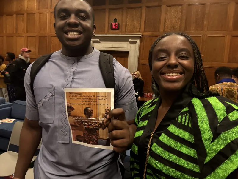My Brother and I holding a pamphlet