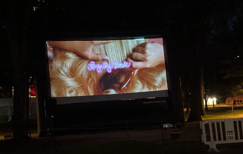The Legally Blonde movie projected on an outdoor blow-up screen.