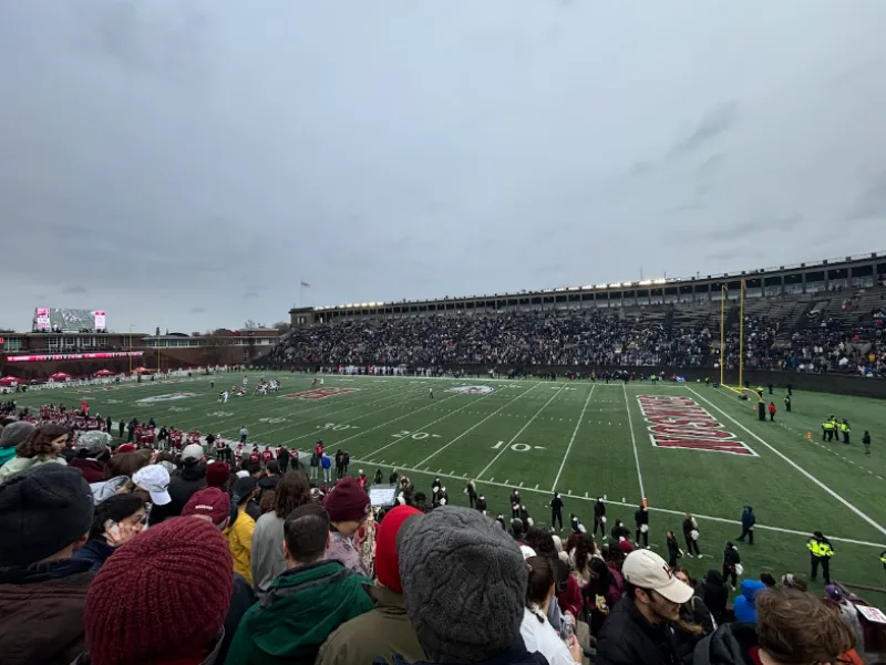 Overview of the football field and crowd on Harvard vs Yale gameday.