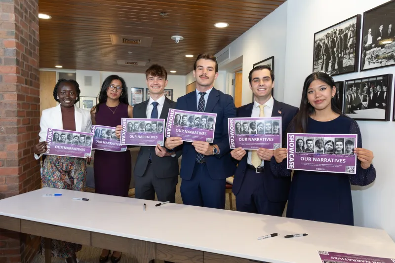 The 6 speakers holding their signed pictures