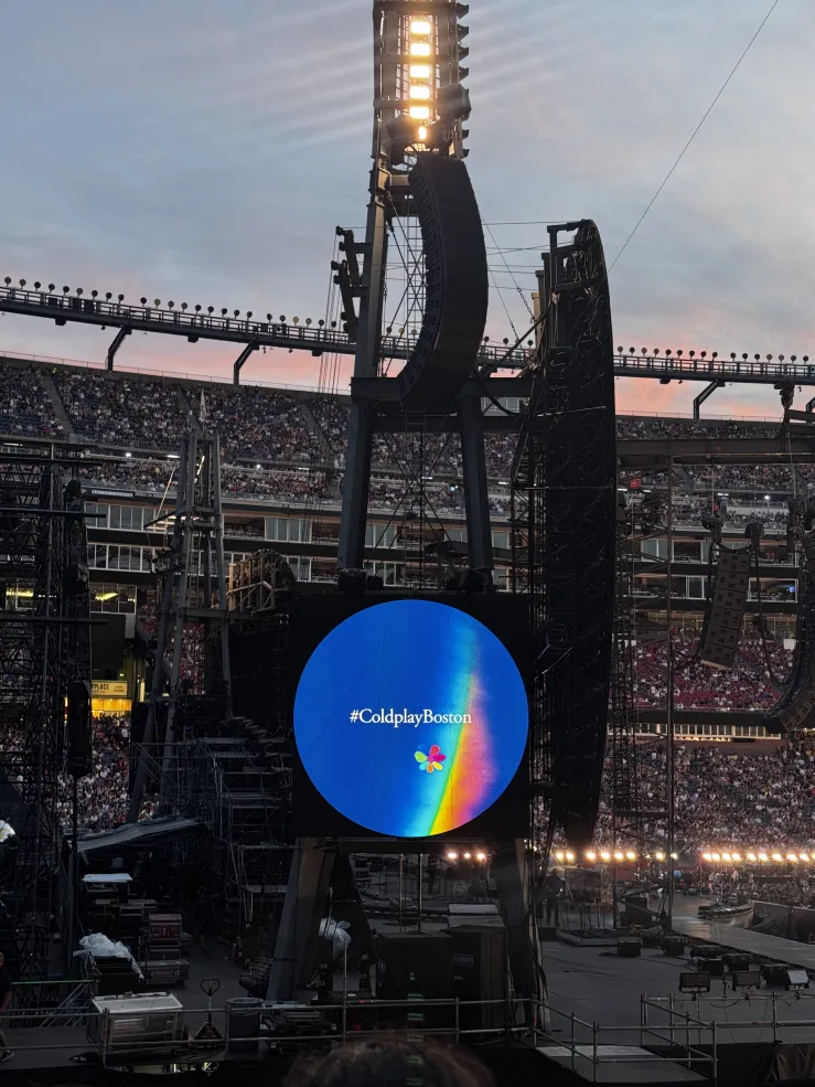 A #ColdplayBoston sign.