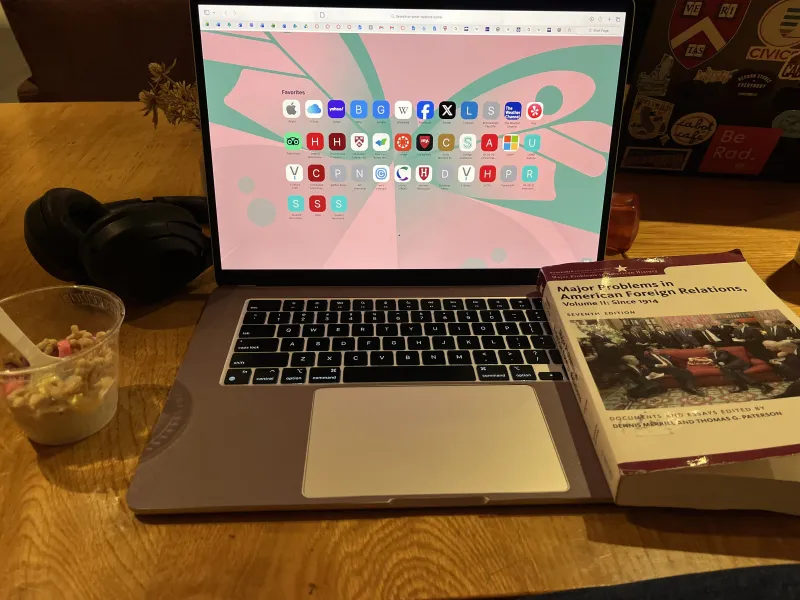 My study set up in Cabot Café, featuring a cup of dining hall Lucky Charms