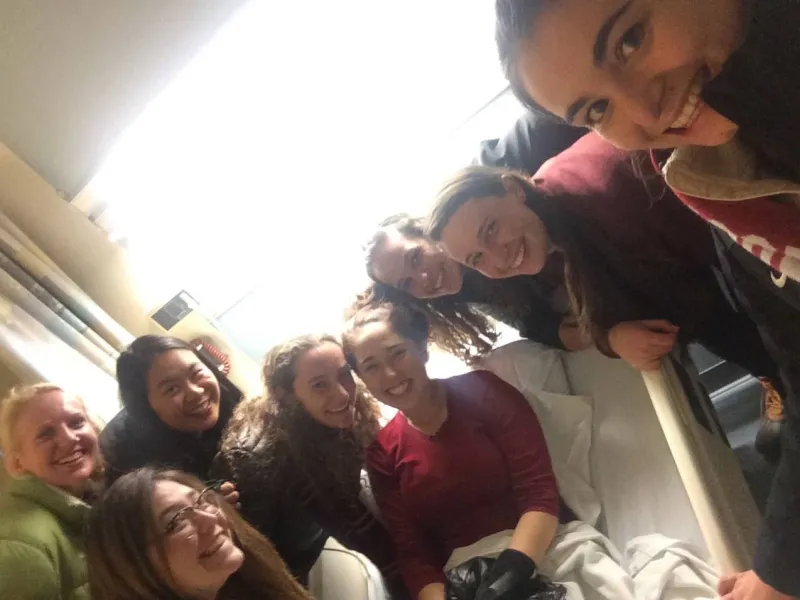 Author's blockmates visit her while she is sick and in infirmary