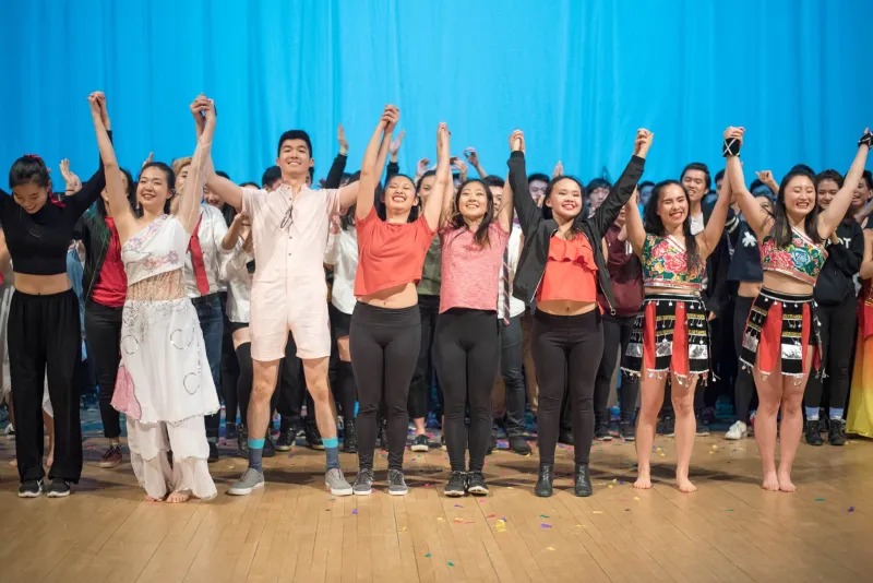 Asian American Dance Troupe bowing after performance
