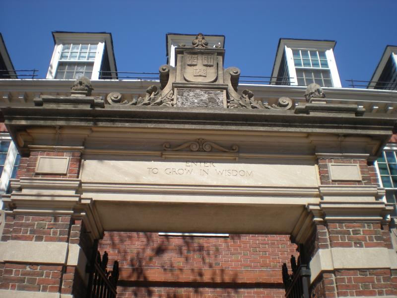 Picture of an entrance way with the inscription "enter to grow in wisdom"