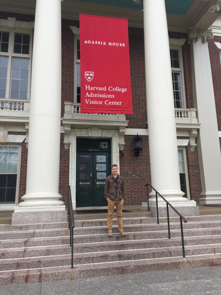 Author on steps of the Agassiz Admissions Visitor Center