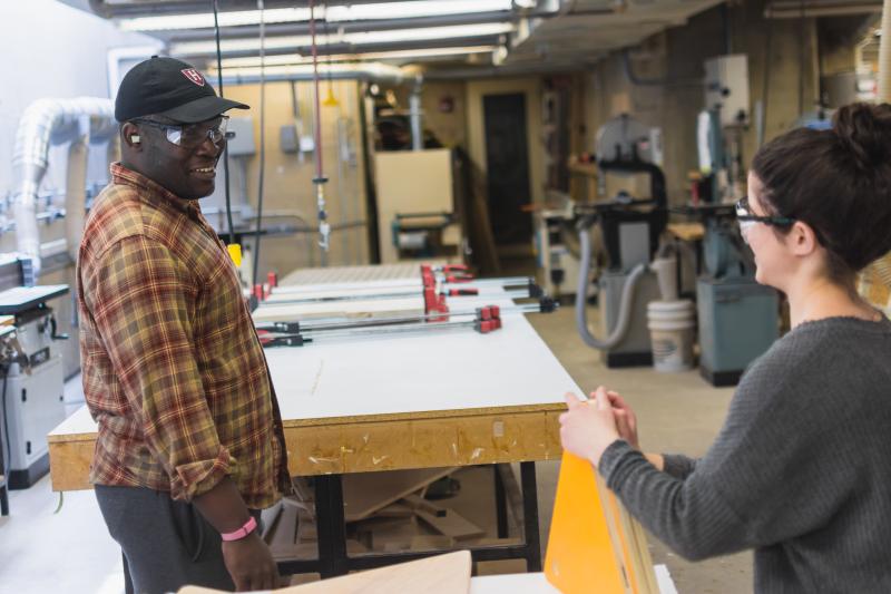 Interviewee and students in fabrication lab