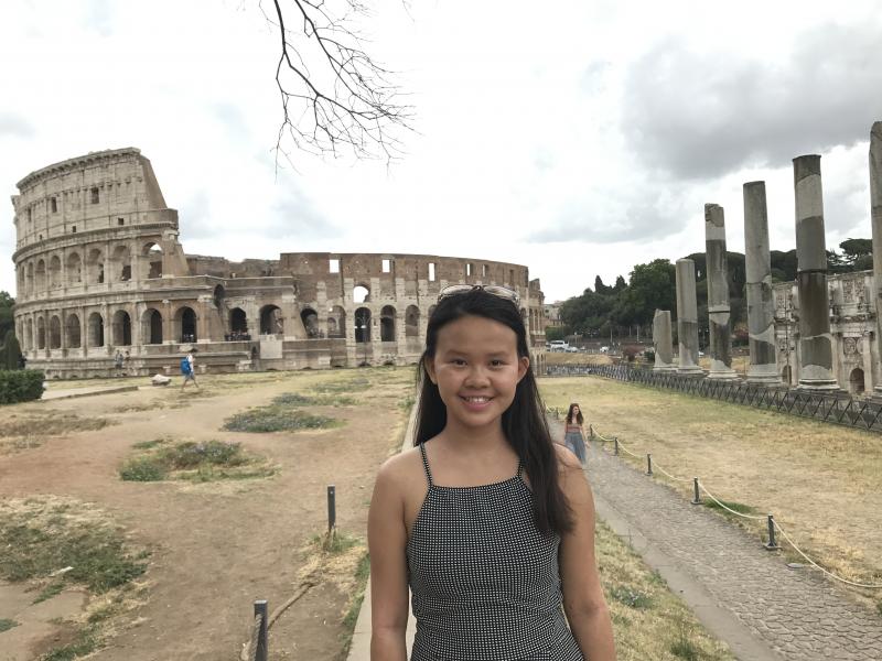 Author standing outside of Roman Colosseum