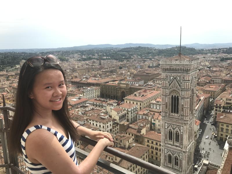 Author on balcony looking out across Florence 