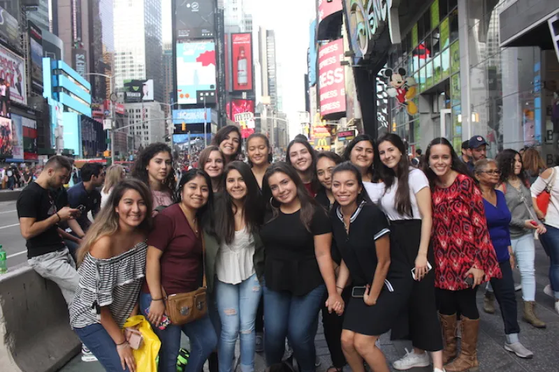 Photograph of author in New York City with members of the Latinas Unidas’ board in 2017
