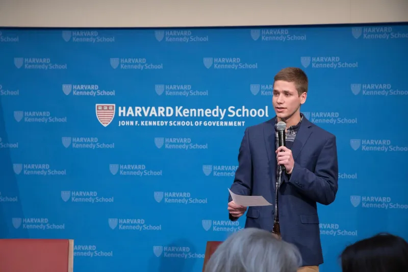 A Student Holding a Microphone