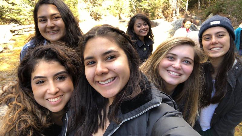 A picture of author with other LU board members near a hiking trail