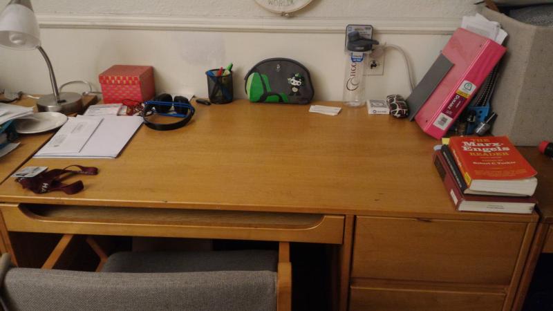 Photograph of author&#039;s desk in dorm room