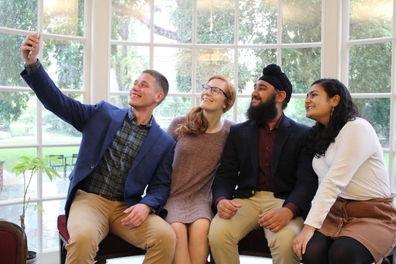 Group of Four Students Taking a "Selfie"