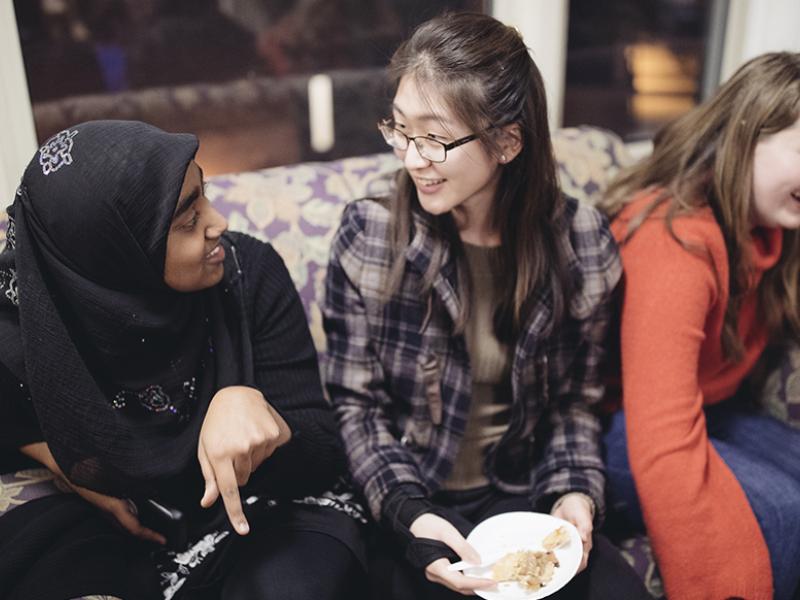 3 female students laughing