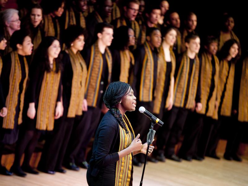 Harvard Kuumba singers performing on stage