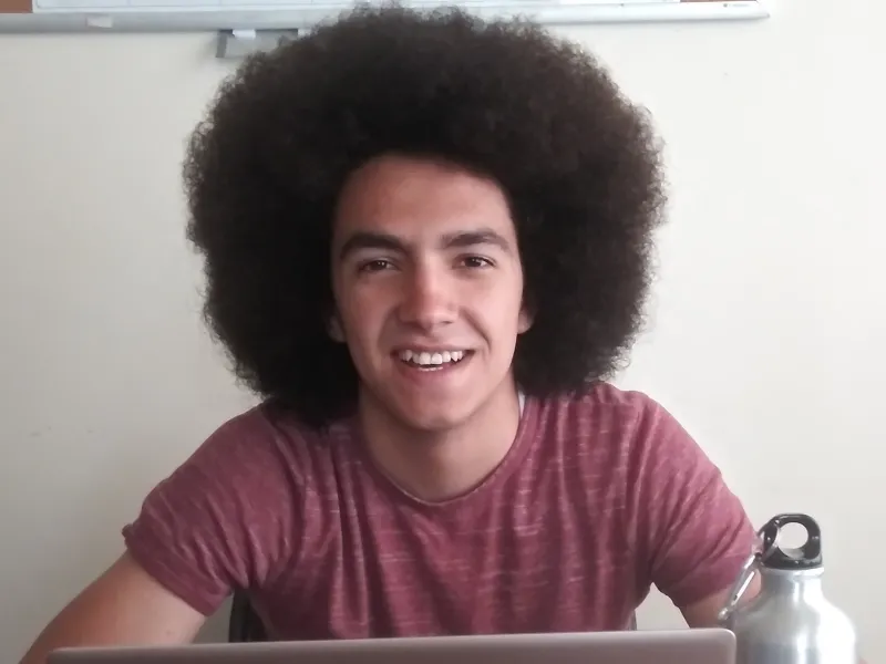 Me sitting at the table with my laptop