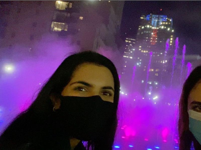 Image of my friend and I at a fountain in Boston