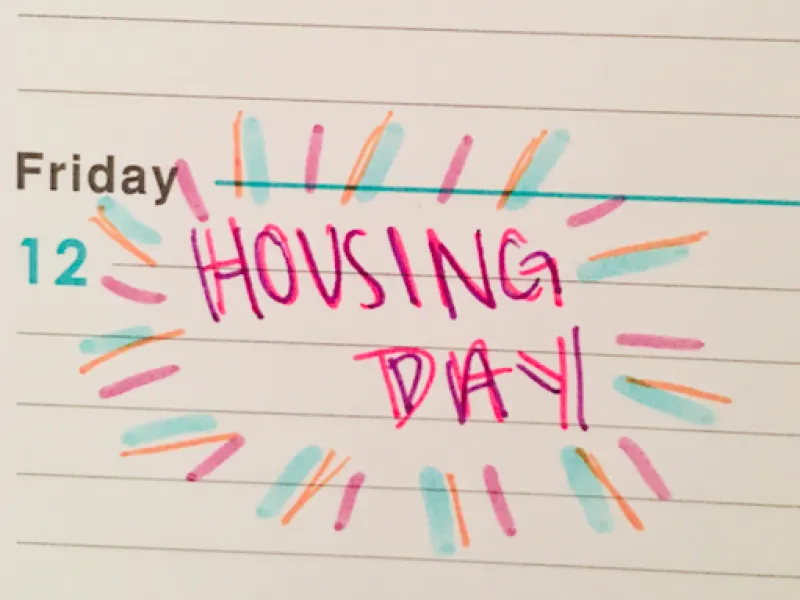 I wrote 'Housing Day' on my agenda's calendar.