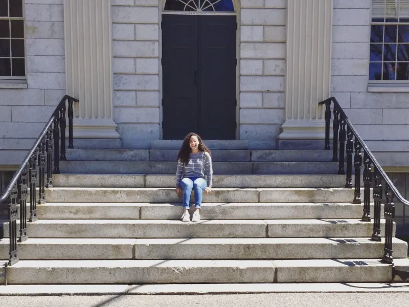 Girl sitting on steps