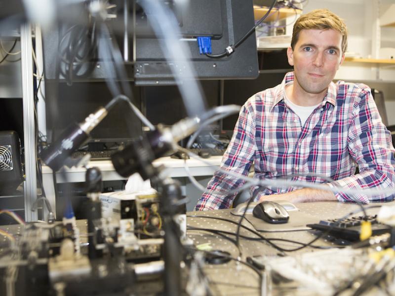 Robert Wood in a robotics lab. Photo credits to Eliza Grinnell, SEAS.