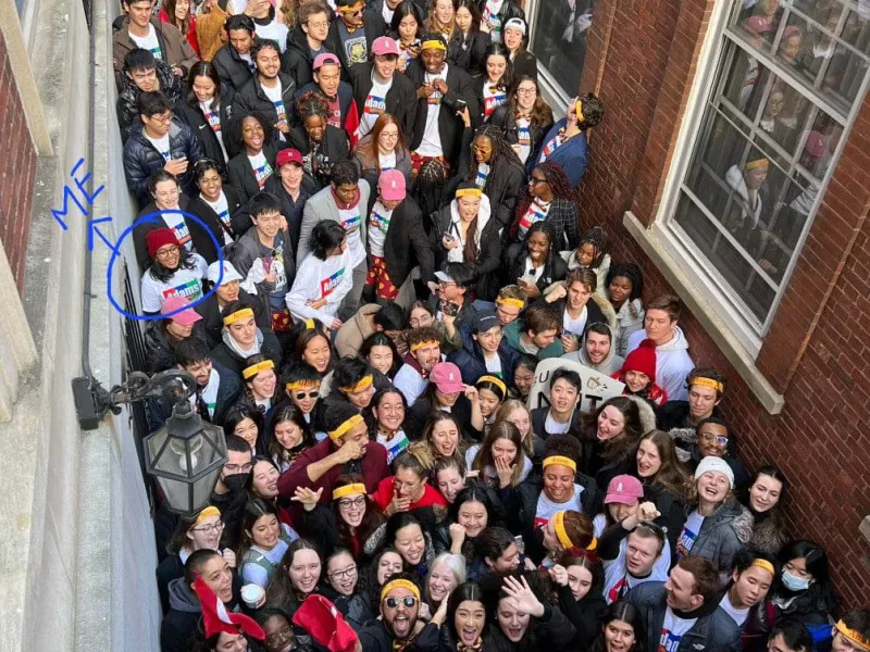Students crowding in front of Adams house