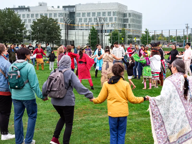 A group friendship dance at the Harvard Powwow. Picture Credits: Cathie Dondero 