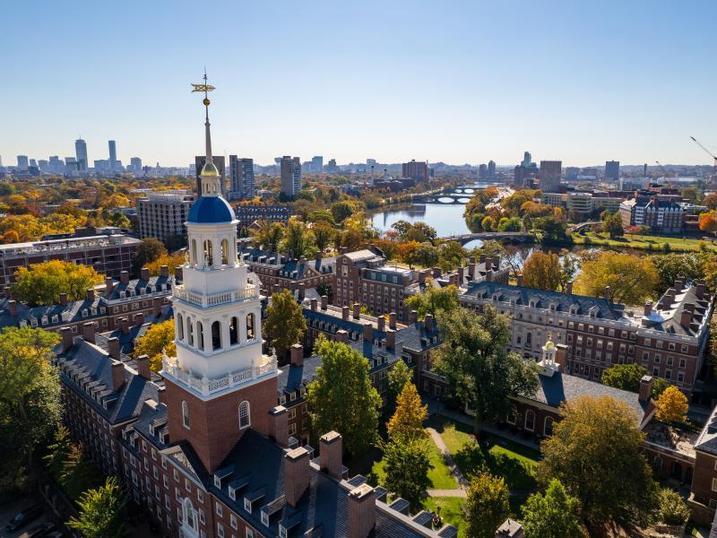 An aerial view of Lowell House tower overlooking the Charles River.