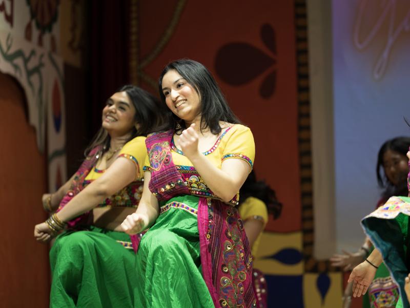 Hana Rehman, co-director of Harvard Ghungroo, the largest student-run production on campus featuring South Asian culture, dancing in her costume for the traditional Garba Raas dance. 