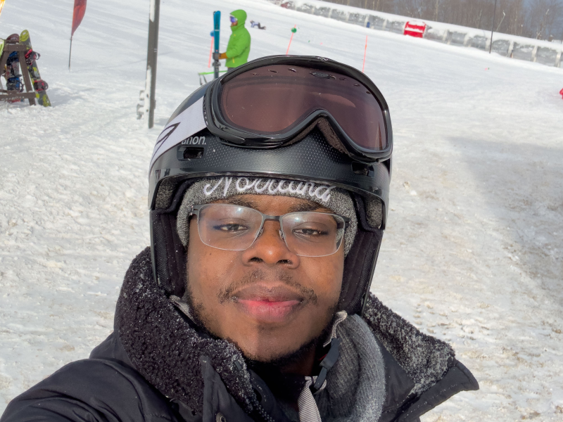 Inno's selfie photo, in horizontal orientation, while at the mountain base