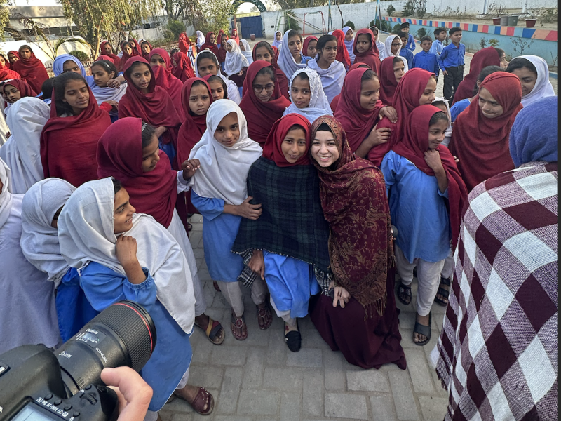 Samia Afrose with students at an all girl's school