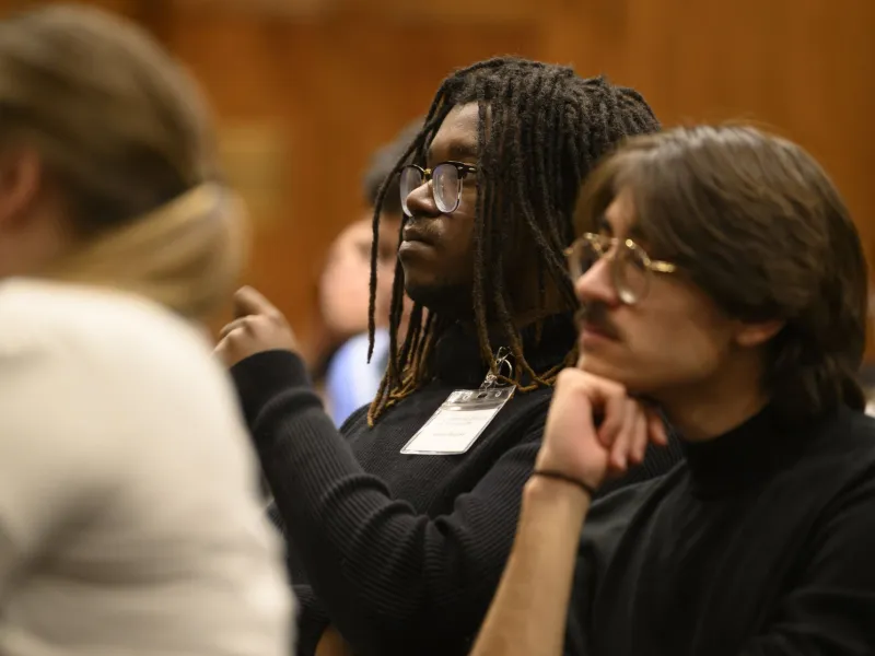 Summit participants listening to Keith Whittington’s remarks.